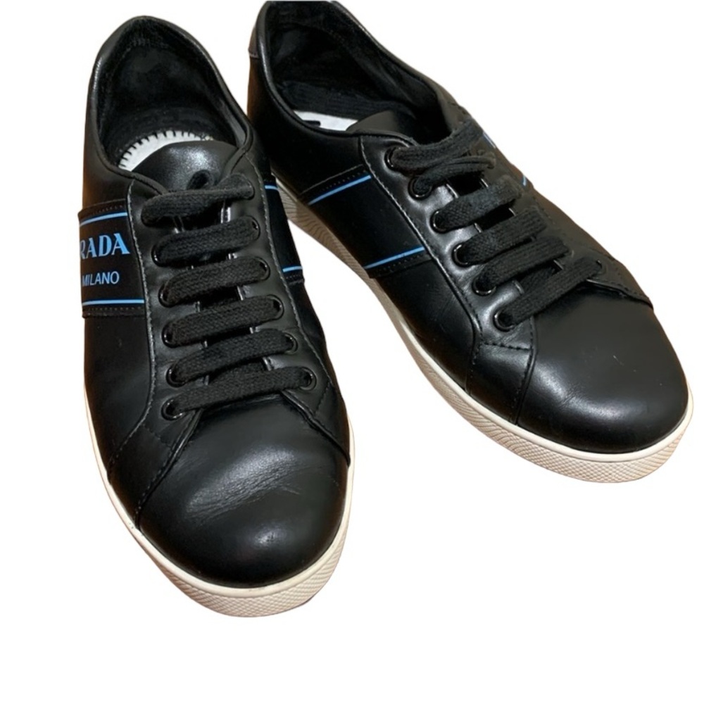 Prada black leather lace-up sneakers